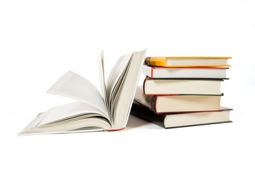 Pile of old books isolated on white
